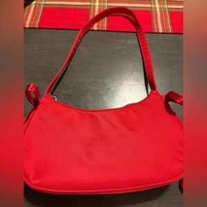 Red shoulder bag with bows